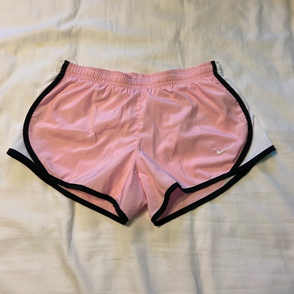 Pink and white Nike shorts